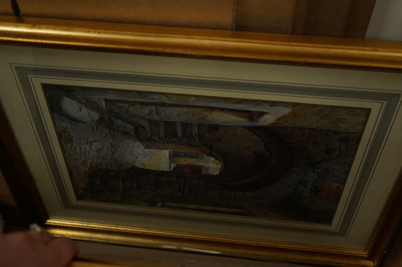 Four early 20th century and later watercolours, to include one by Sam Garratt, Riverscape and a French School watercolour, View of an archway, largest 38 x 25cm. Condition - fair
